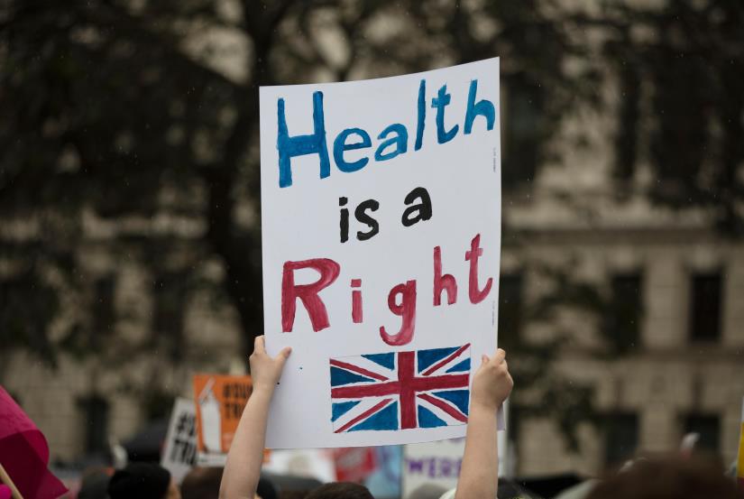sign saying health is a right